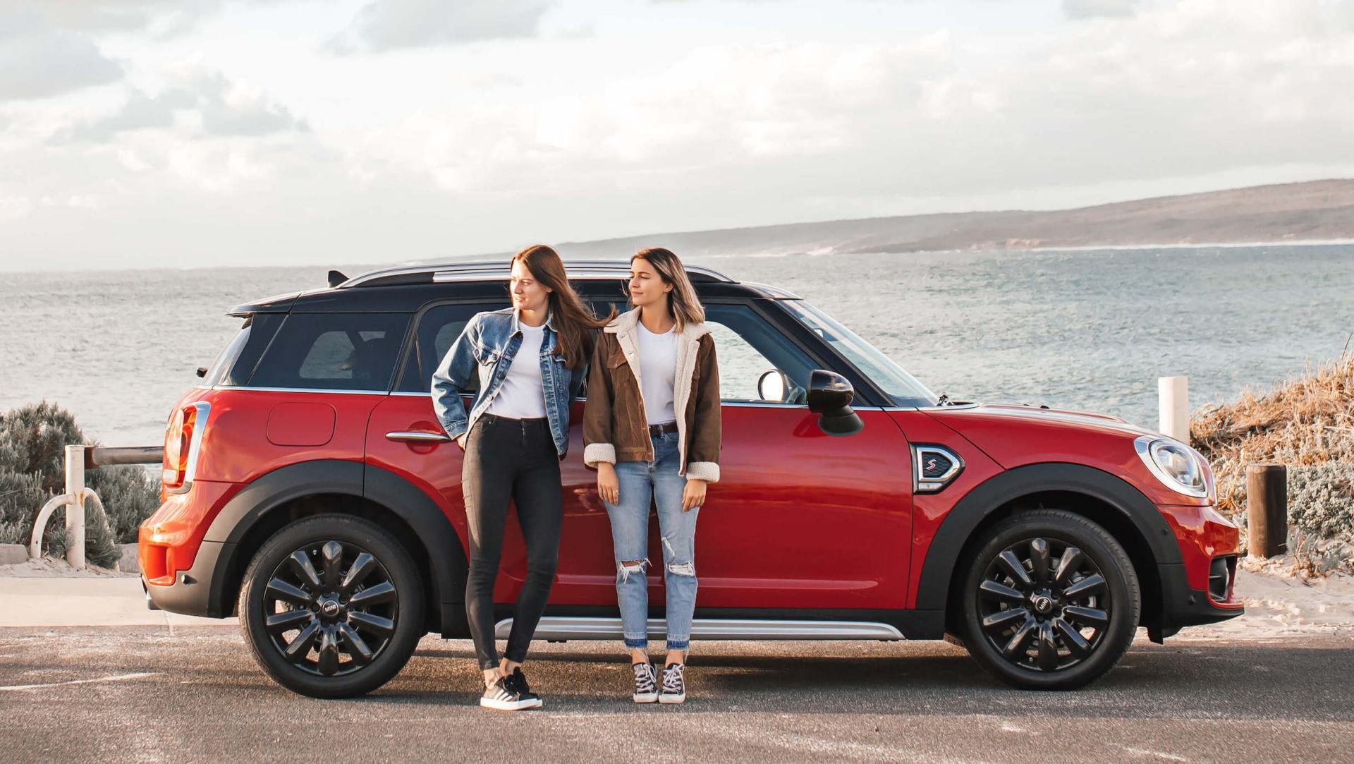 A red MINI taken on a driving adventure near the sea